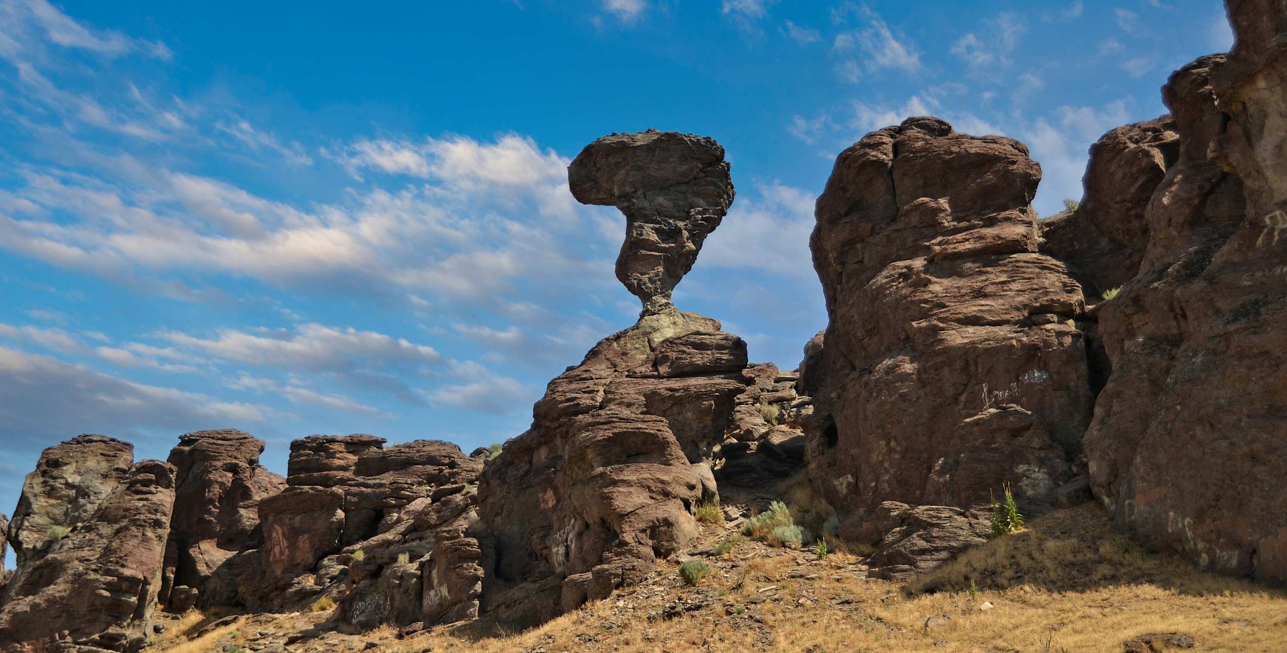 Balanced Rock in Idaho on a clear blue day.