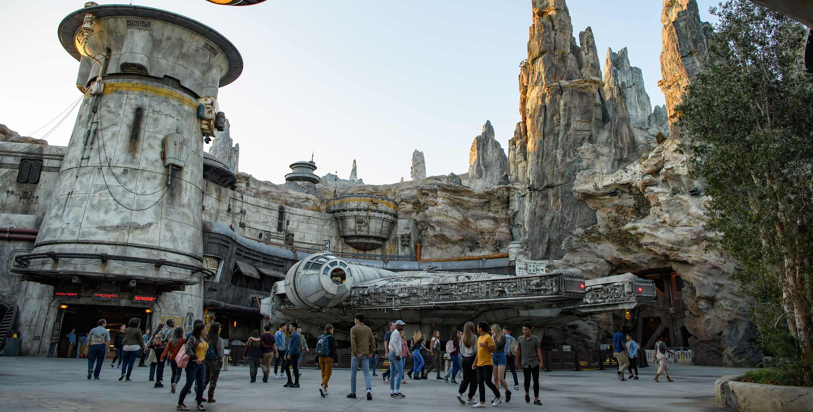 Poeple walk past Star Wars: Galaxy’s Edge at Disneyland Park in Anaheim, California.