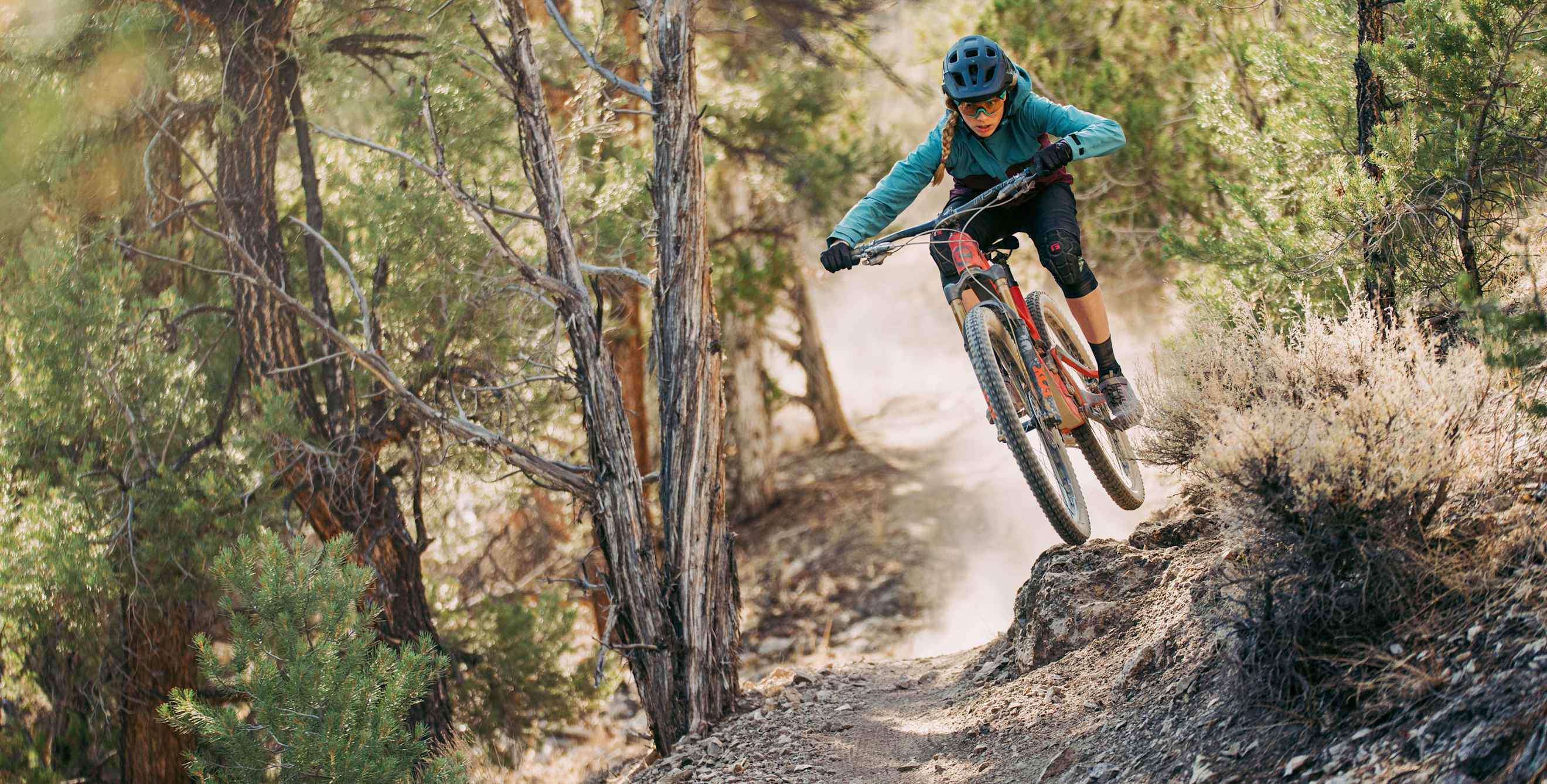 A woman mountain bikes on the Total BS Trail in Ely, Nevada.