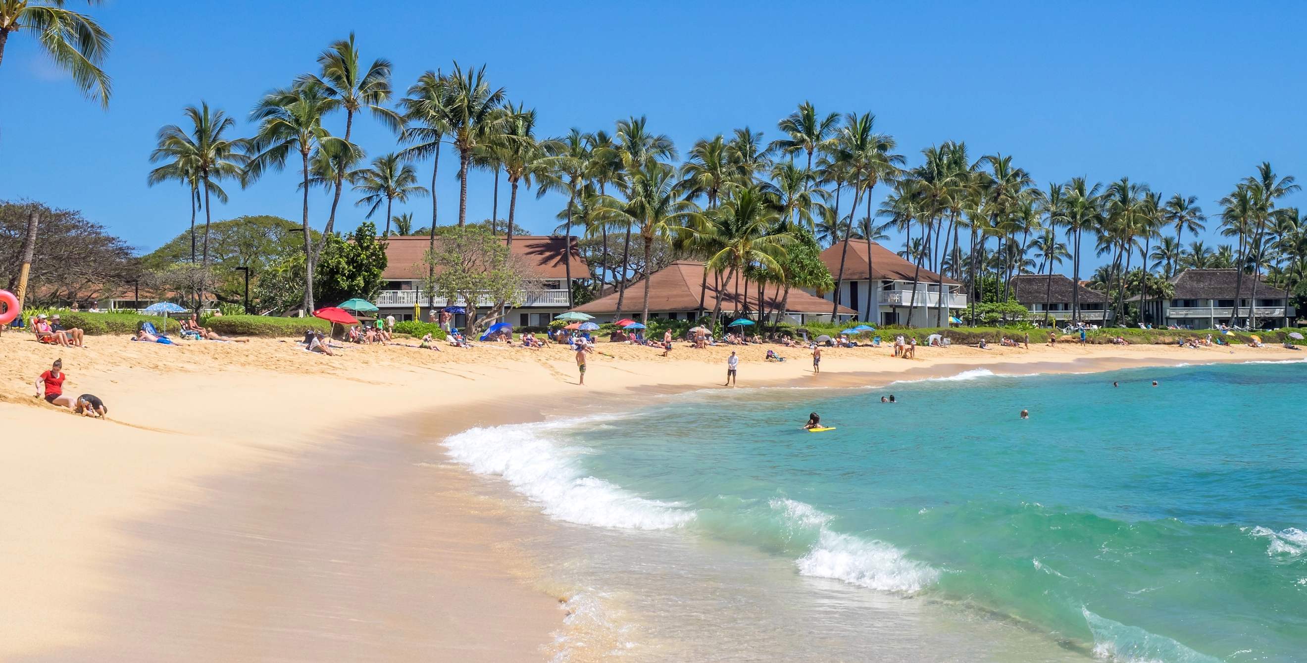 Poipu Beach in Kauai, Hawaii on a clear day