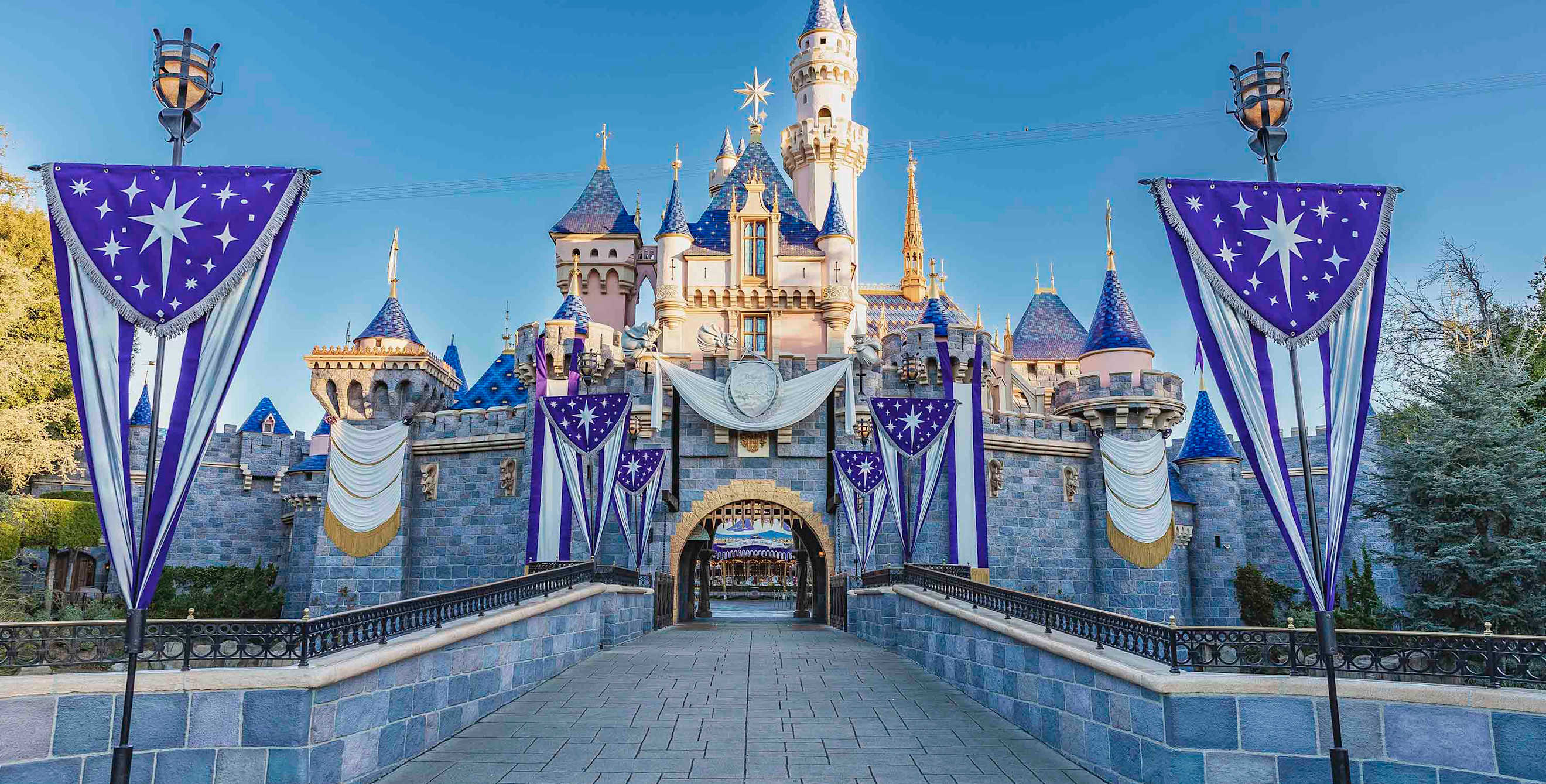 Disneyland castle decorated for Walt Disney 100 anniversary.