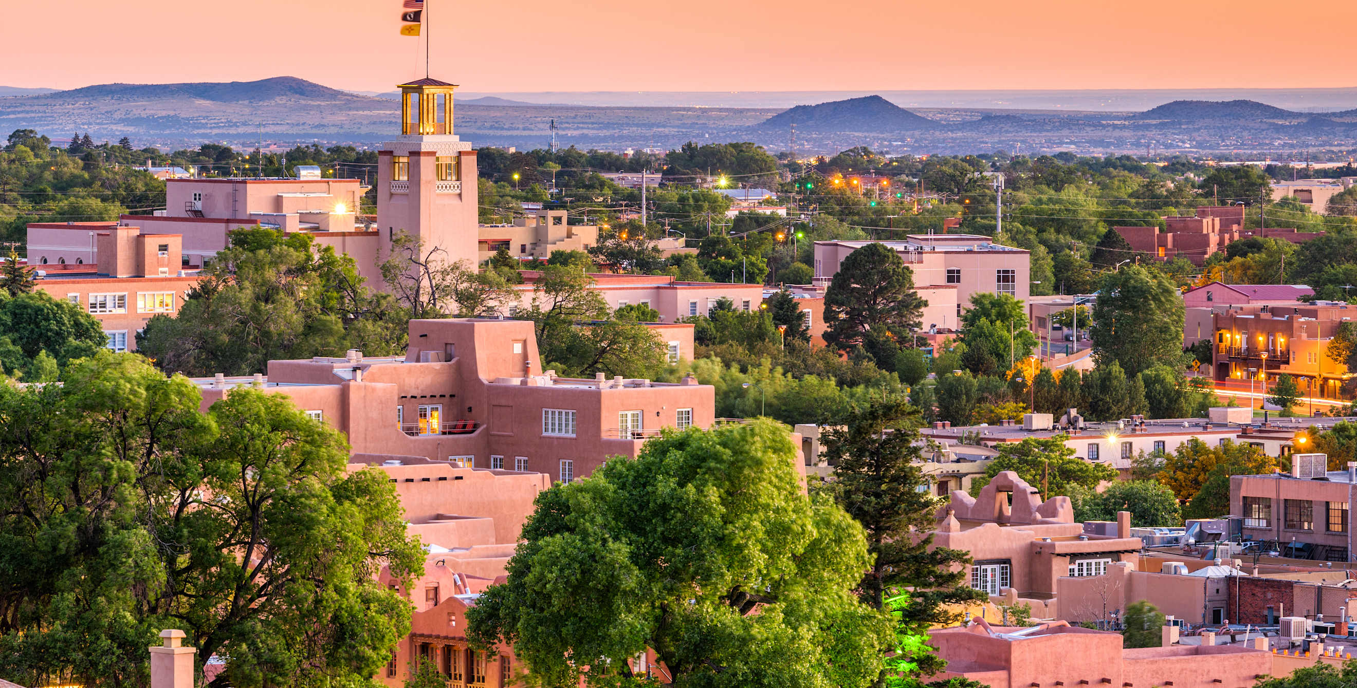Sun sets over downtown Santa Fe, New Mexico.
