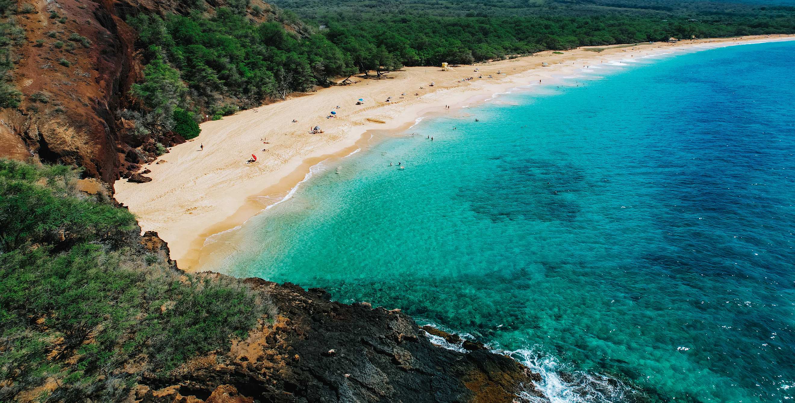 People lounge and play at Big Beach on Maui, Hawaii.