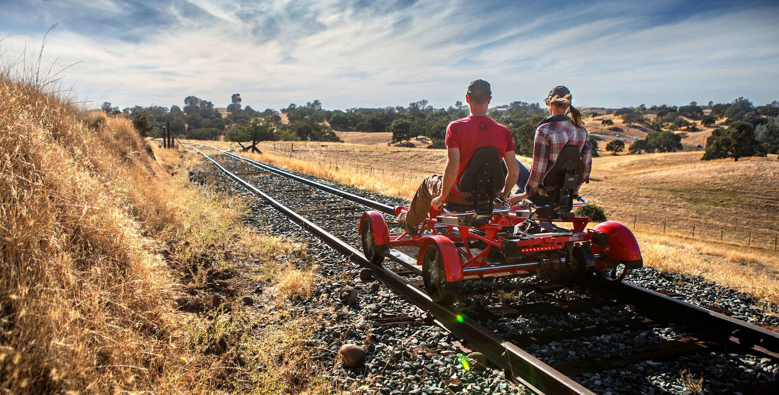 A couple pedal on old railroad tracks with Rail Explorers in Amador County.