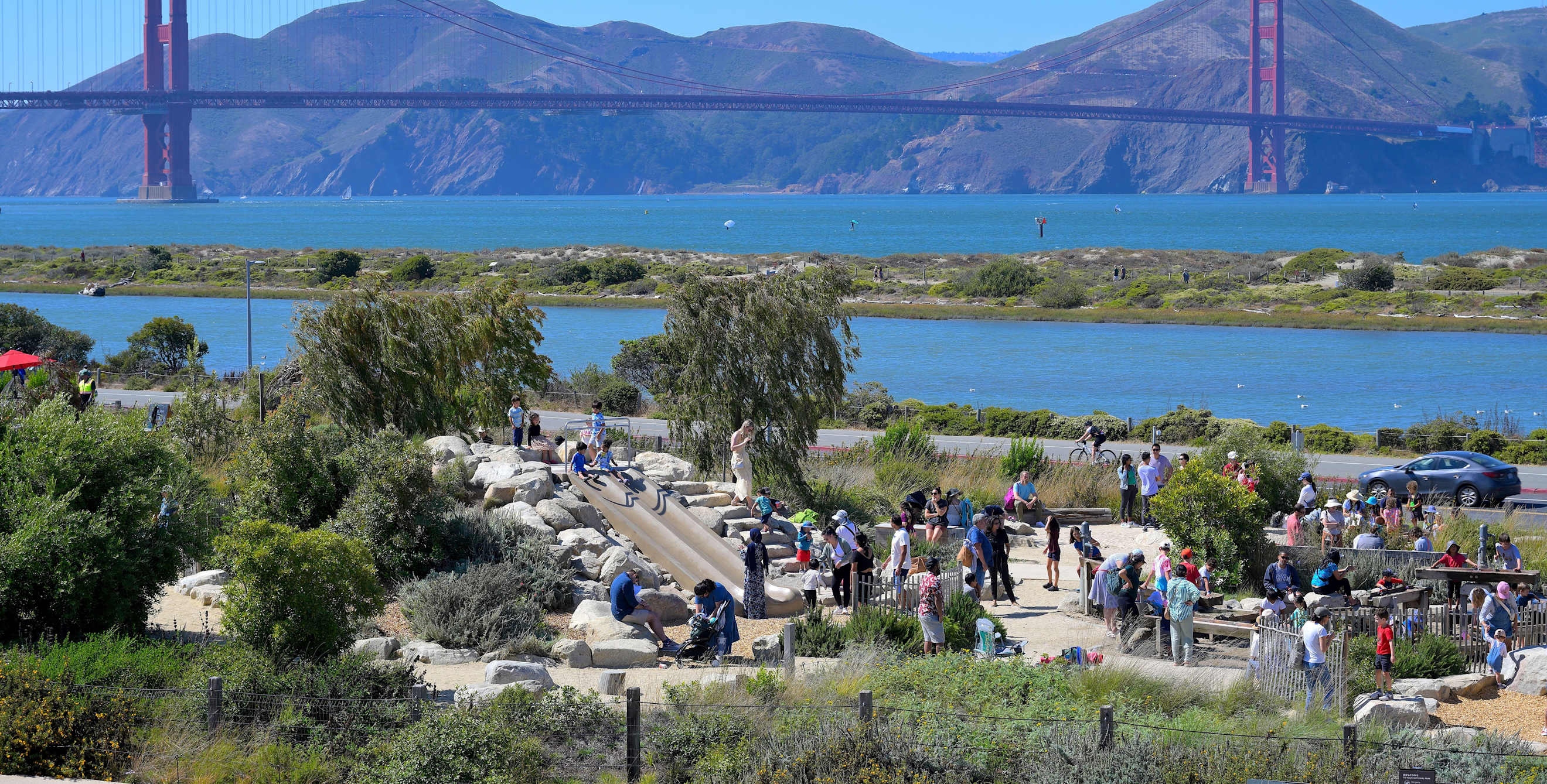 Families play at the Presidio Tunnel Tops in San Francisco, California.