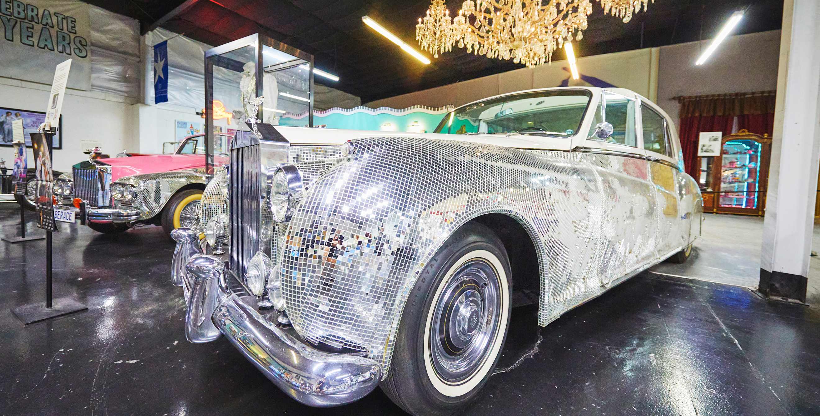 a rolls royce car covered in bling