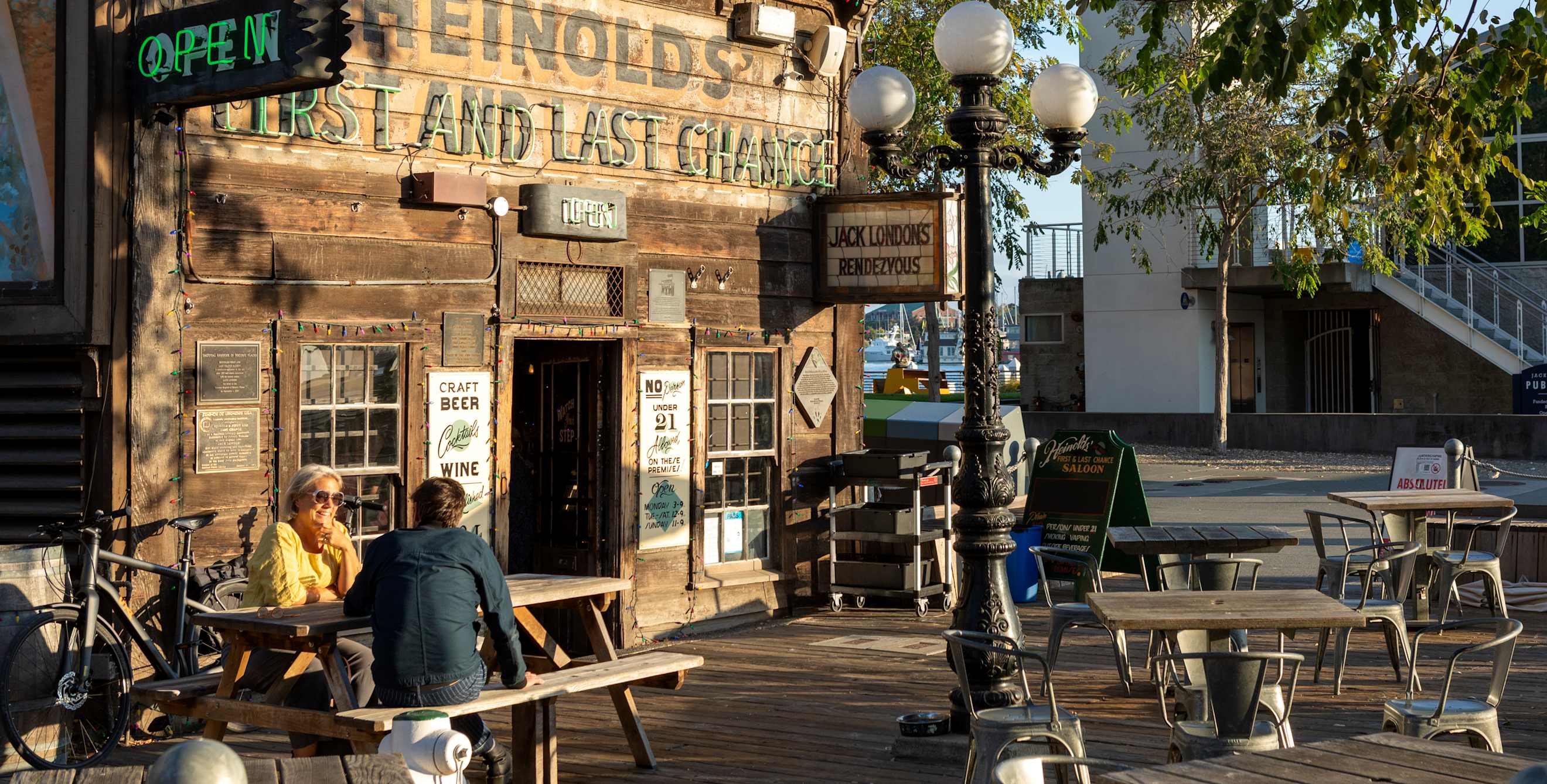 The log cabin-style exterior of Heinold's First and Last Chance Saloon in Oakland.