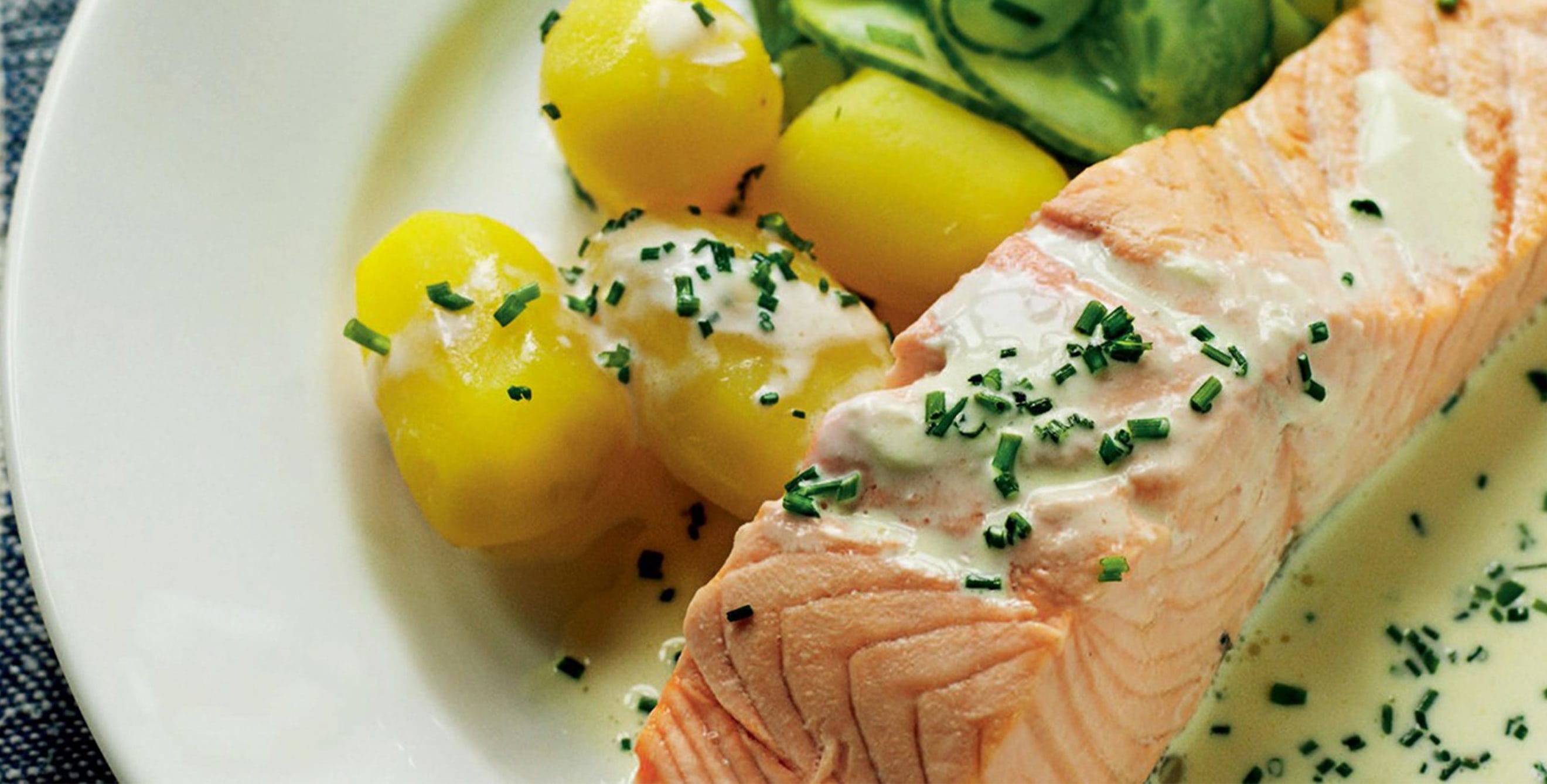 poached salmon with potatoes and cucumber salad