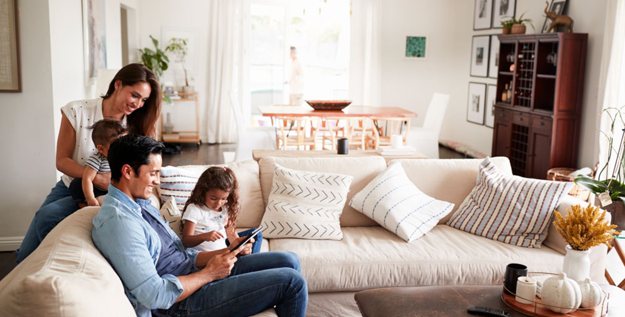 Family looking at tablet