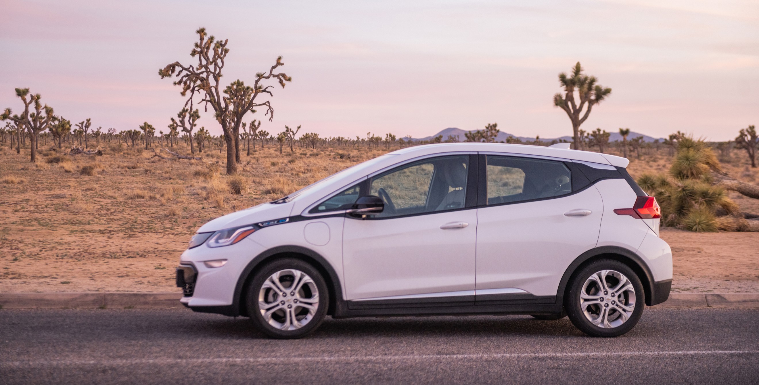 A Chevy Bolt EV on a desert road in Joshua Tree National Park.