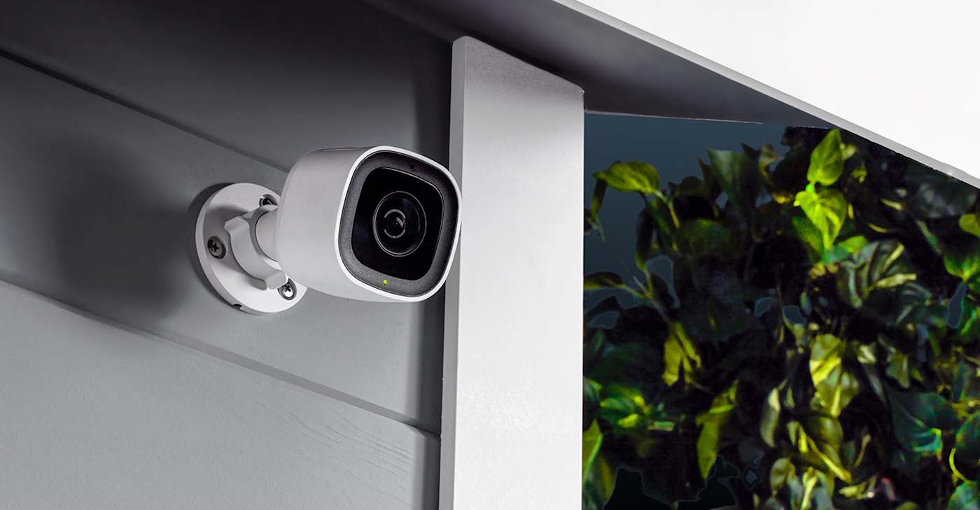 security camera mounted to exterior overhang, picture