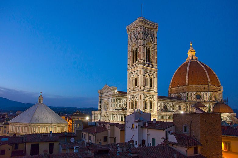 Giotto's bell tower at twilight next to the Duomo cathedral in Florence, Italy, picture