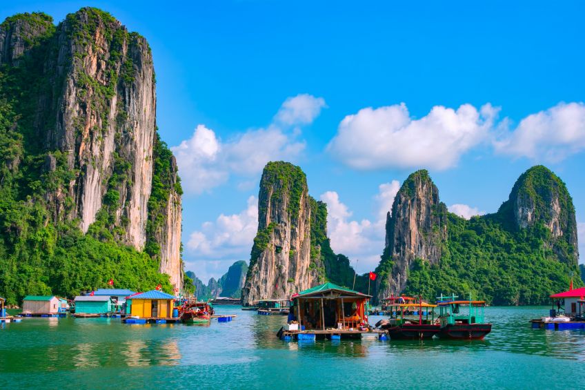 Floating fishing village and rock island in Halong Bay, Vietnam, Southeast Asia, picture