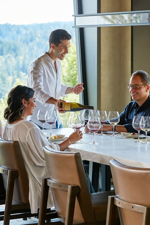 Visitors at Gary Farrell Vineyards and Winery taste wines in the Meadowview room, image