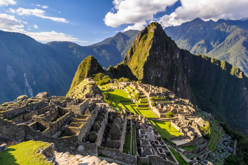 Machu Picchu breaks through the clouds in Peru, image