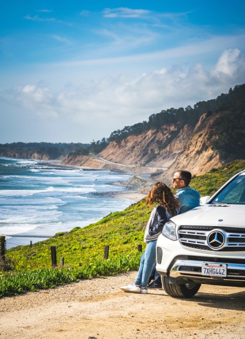 father and daughter take in ocean vista by highway 1, near Half Moon Bay, Calif., picture