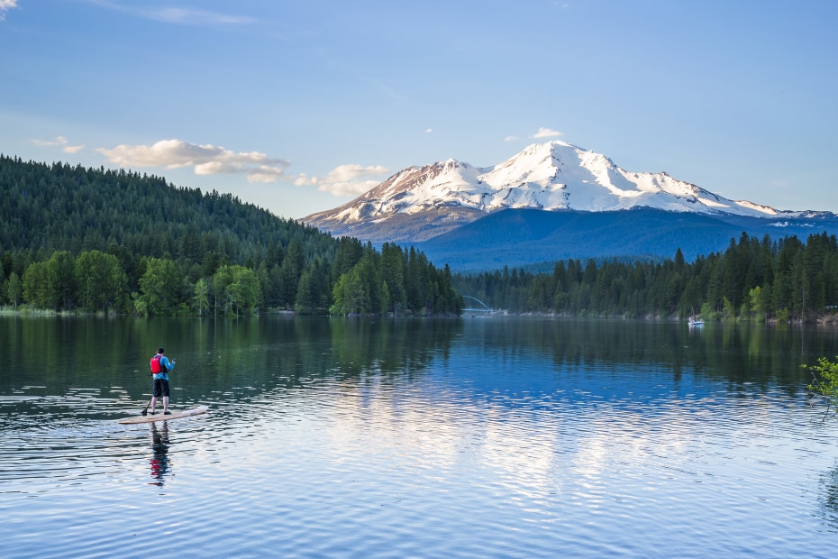 view of paddleboarder on Lake Siskiyou with Mount Shasta in background, picture