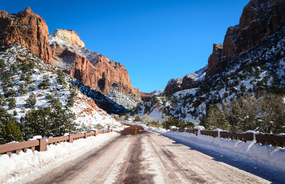A snowy road leading through Zion National Park in Utah, picture