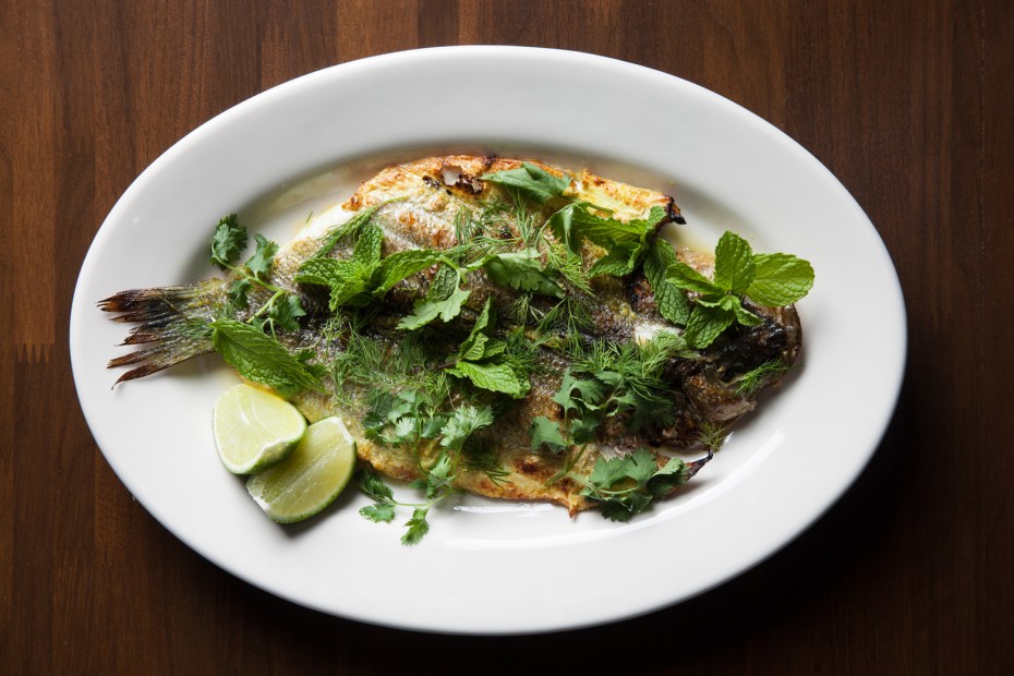 sea bass, grilled whole, with turmeric, dill, and lime, at Cassia in Santa Monica, picture