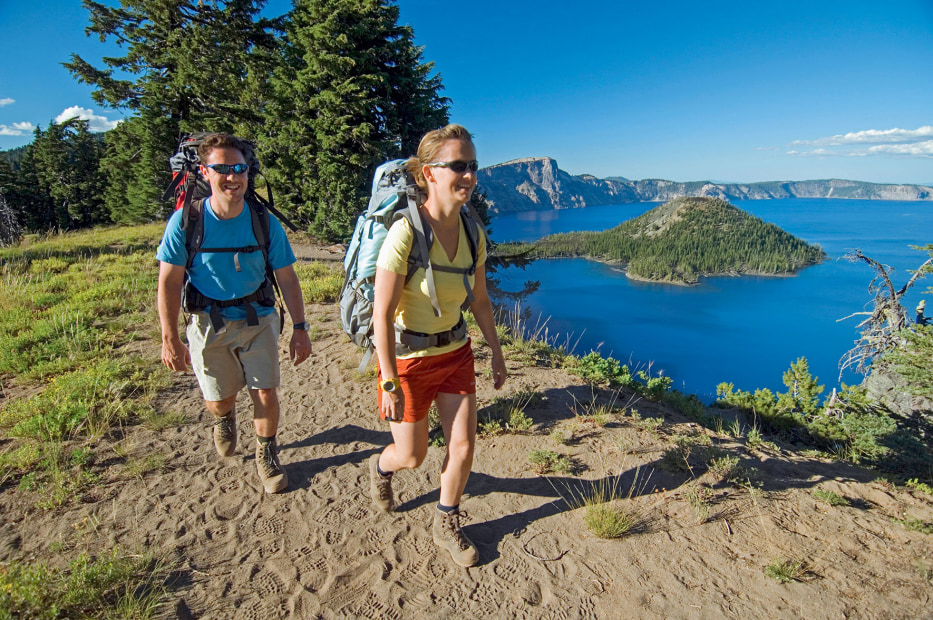 a couple hikes near Crater Lake with Wizard Island in the background