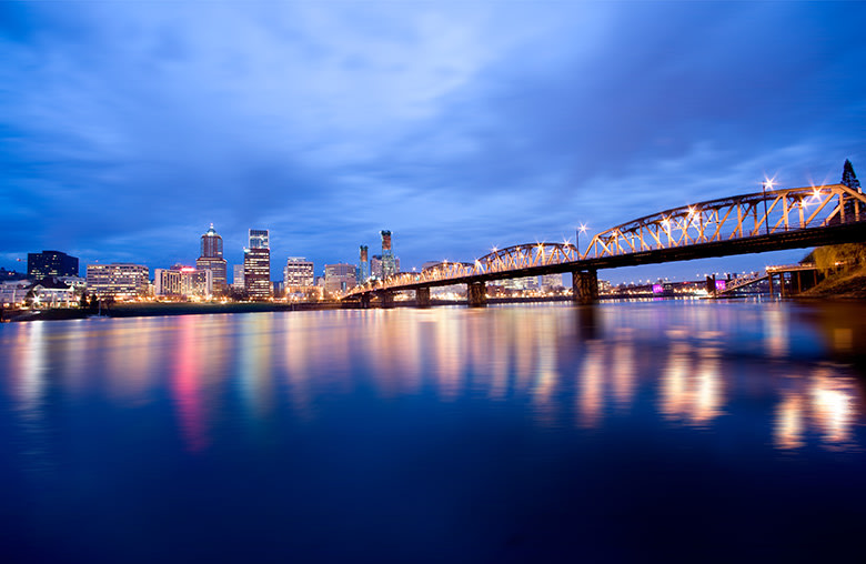 Hawthorne Bridge crosses the Willamette River at dawn in downtown Portland, Oregon, picture