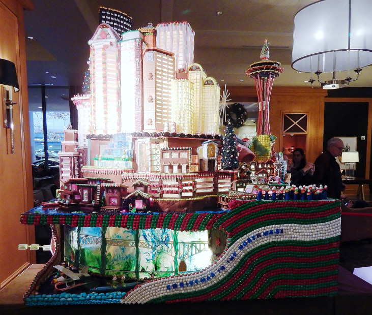 a skyline of Seattle made with gingerbread, icing, and candy, picture