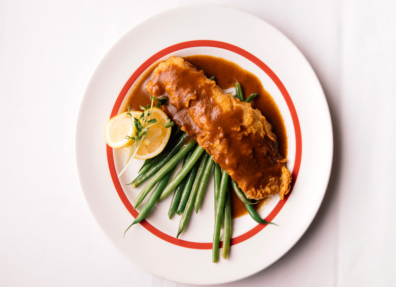 speckled trout with sweetbreads in meunière sauce served at Arnaud's in New Orleans, picture