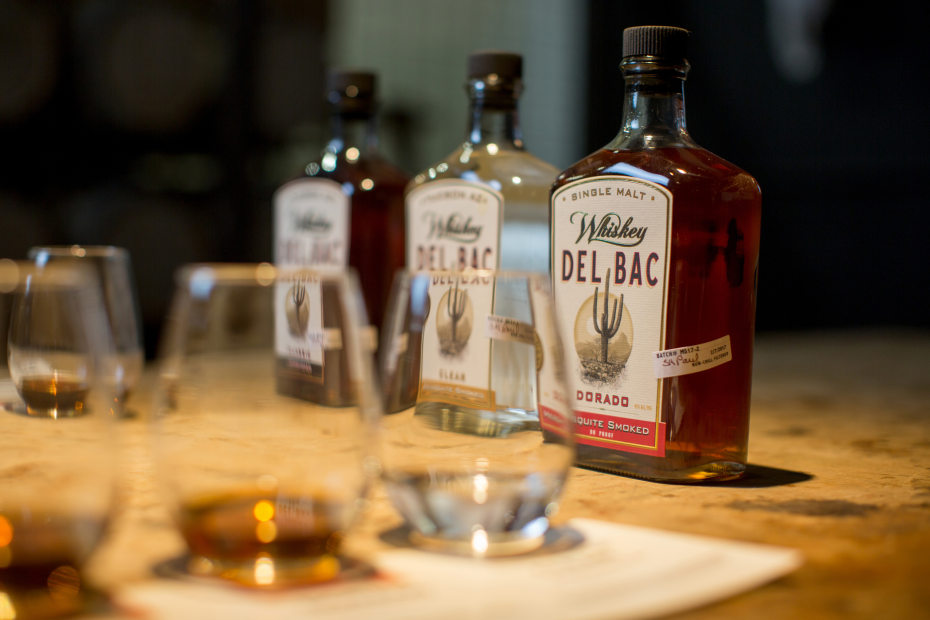 bottles and samples of Whiskey Del Bac at Hamilton Distillers in Tucson, Arizona, picture