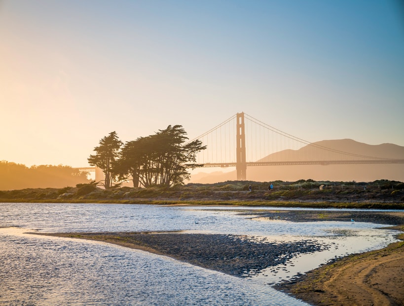 view at sunset across Crissy Field towards Golden Gate in San Francisco, California, picture