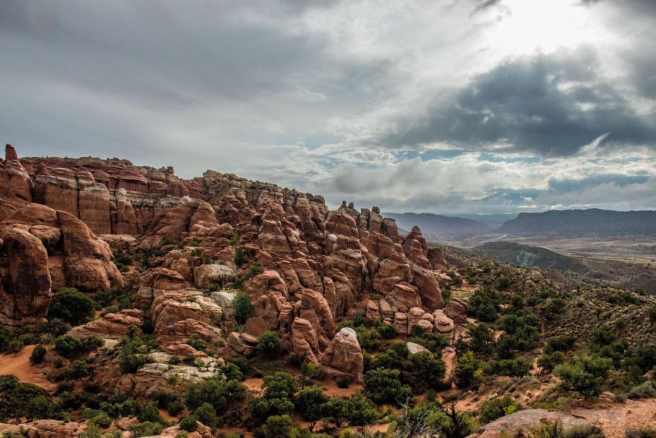 Rain clouds linger over Fiery Furnace in Arches National Park, Utah, image