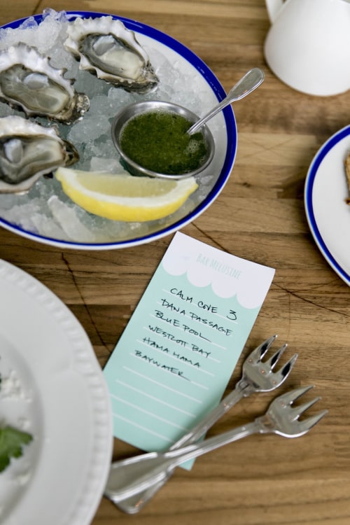 Raw oysters with mignonette on ice beckon at Bar Melusine in Seattle, WA, photo