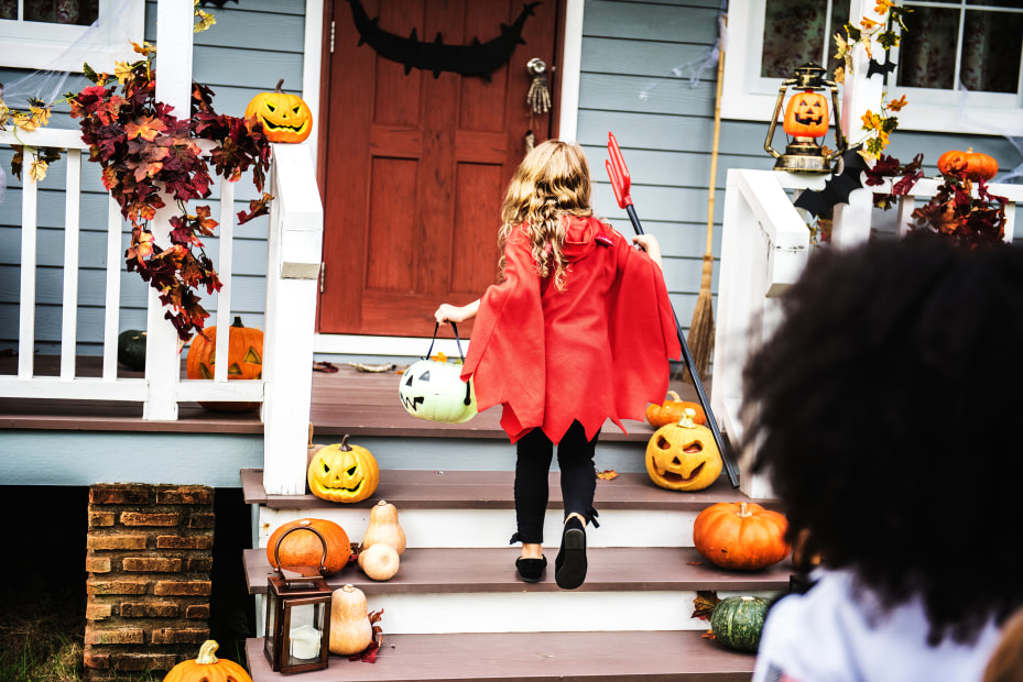 two girls trick-or-treating, picture