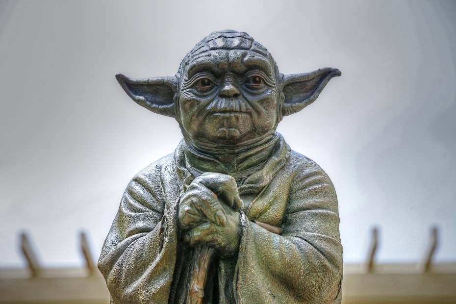 picture of yoda atop the yoda fountain in front of the letterman digital arts building the presidio