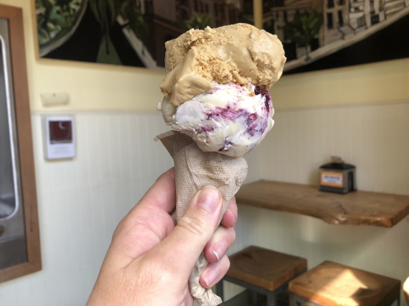 a picture of double scoop of salted caramel and pb&j in a sugar cone at Bi-Rite Creamery in the Mission