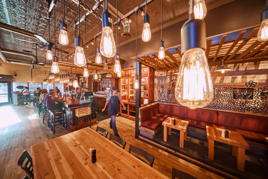 photo of Merkin Vineyards Tasting Room and Osteria with a fancy light fixture in the foreground