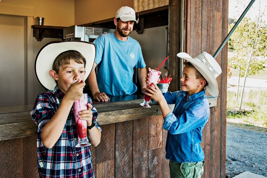Kids drink raspberry shakes at Conestoga Ranch, Utah, picture