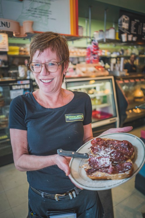 Karen Kornblatt with her namesake sandwich at Kornblatt's Delicatessen in Portland, picture