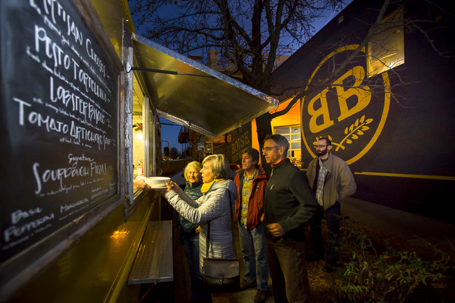 people lined up at a food truck outside Boise Brewing, picture