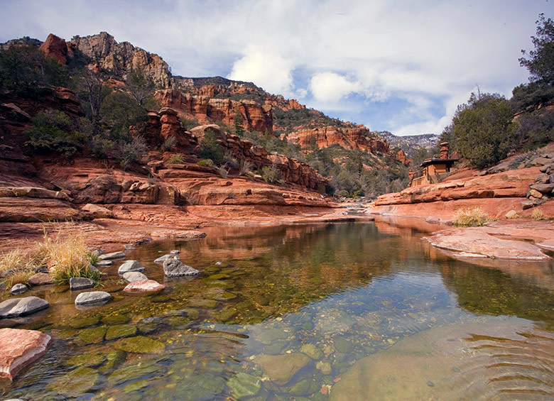 red rocks and juniper line the banks of Oak Creek at Slide Rock State Park near Sedona, Arizona, picture