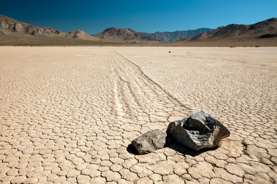 Twin rocks carve a path on Death Valley's captivating racetrack, image