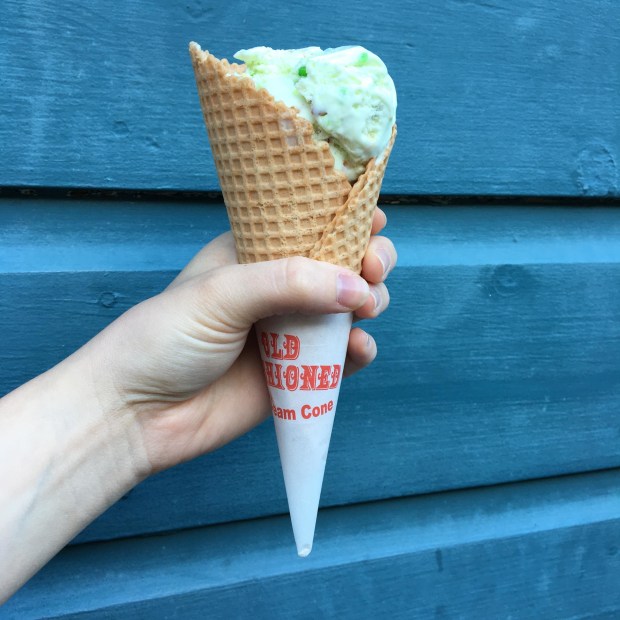 a scoop of pistachio ice cream in a waffle cone at Treats in Nevada City, California, picture