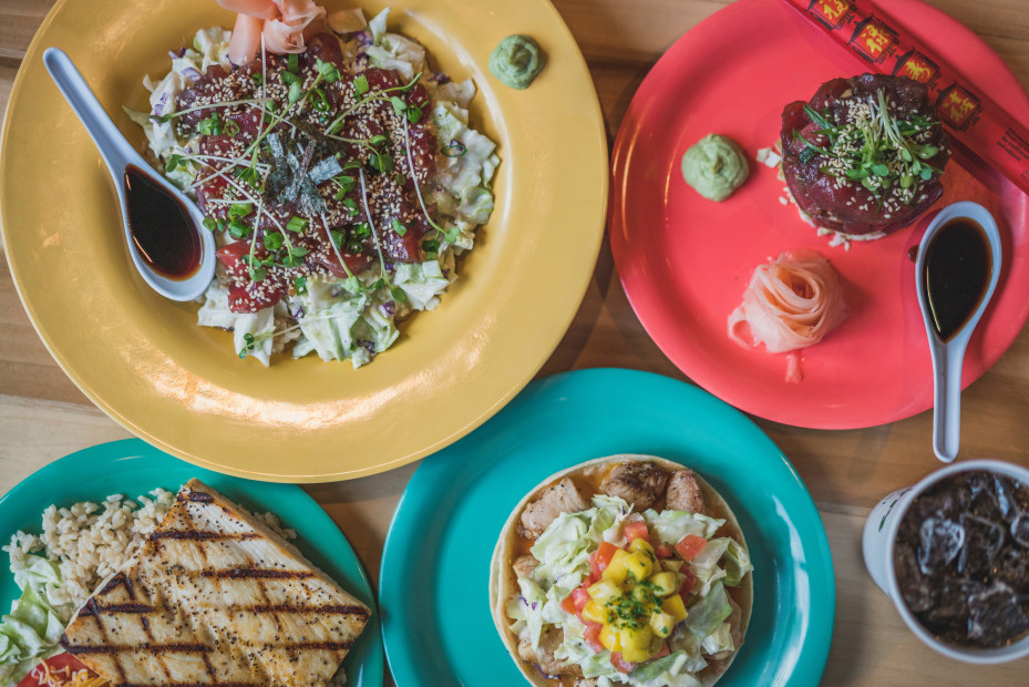 assorted plates of Hawaiian food at Coconut's Fish Cafe in Sacramento, picture