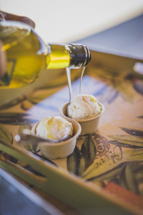 Vanilla ice cream with olive oil at Kiler Ridge Olive Farm, Paso, California, image