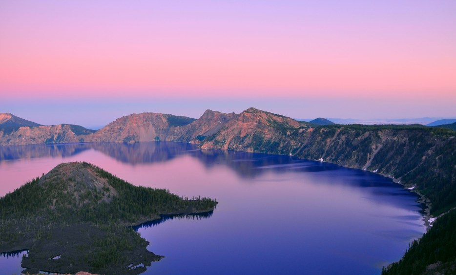 pink and purple hues in the sky over Crater Lake, picture