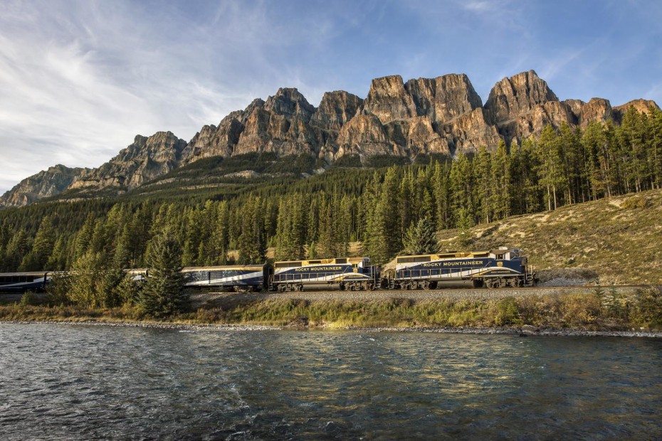 The Rocky Mountaineer rolls past Castle Mountain in Alberta, Canada, photo