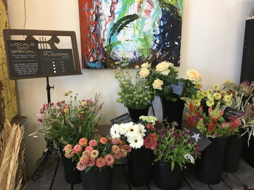 Local flowers on display in the Barlow marketplace, image