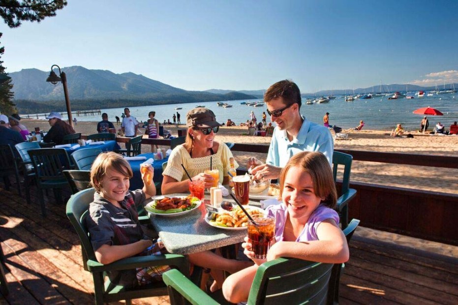 family dining outdoors at Camp Richardson's Beacon Bar & Grill, picture