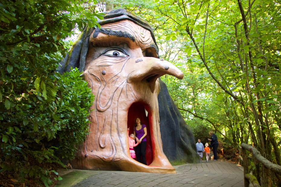 A mother and daughter stand inside the witch's mouth in Enchanted Forest at Turner, Oregon, image