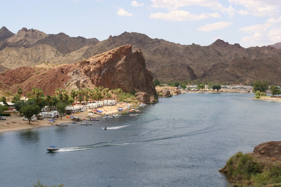 RV campsite in the lower Colorado between Lake Havasu and Parker with boat and jetski , picture