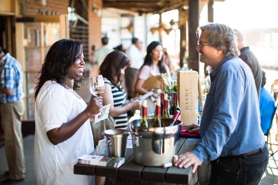 guests taste Dashe wines at an Oakland Urban Wine Trail event, picture